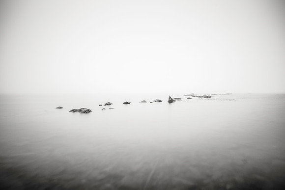 Rocks on the surface in the fog